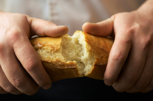 Hands Breaking Open A Baguette Image By C Beau Lark Corbis